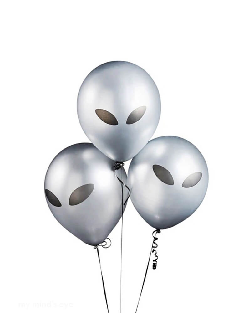 Three of Momo Party's 11" Alien Latex Balloons by Hooty Balloo. These silver alien balloons are a perfect addition to any space theme party! Transform any ordinary party into an out-of-this-world experience with these stellar silver alien balloons! Guaranteed to add a touch of intergalactic charm to your space-themed shindig!