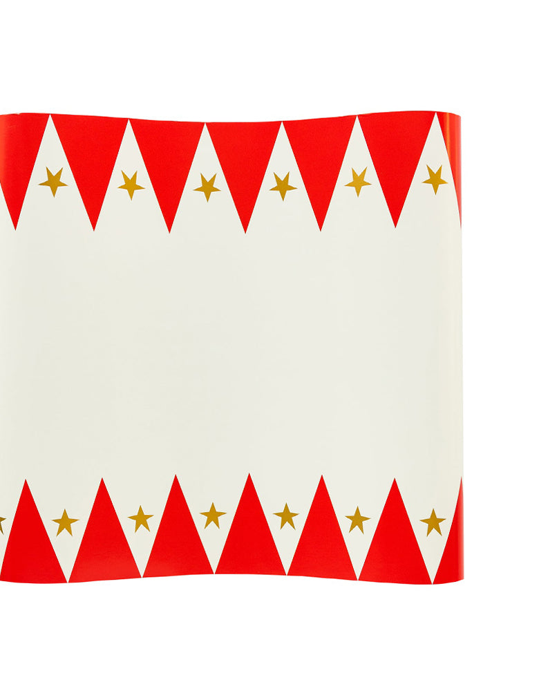 Momo Party's Carnival Paper Table Runner by My mind's eye. Featuring gold foil stars and a carnival inspired print, this table runner is the perfect foundation piece to build a whimsical tablescape around at your next carnival themed celebration

