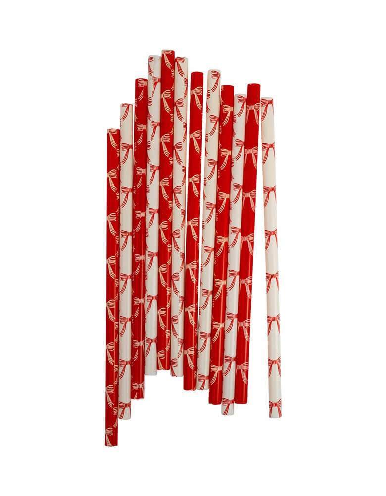 Momo Party's Christmas Bows Reusable Straws by My Mind's Eye. These festive and sustainable straws feature adorable bows in the classic holiday colors of red and white and can be used over and over again. Say hello to a touch of holiday cheer!