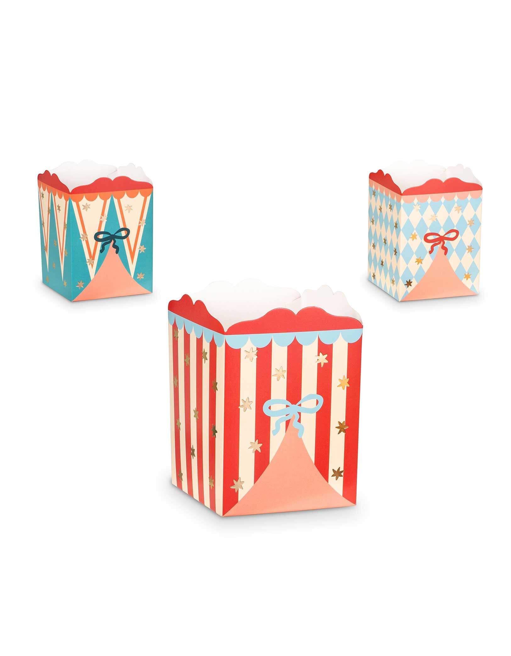 Momo Party's 3.15" x 4.5" x 3.15" Circus Party Snack Boxes by Party Deco. Comes in a set of  in 3 different colors/designs, this set of vibrant, festive boxes is perfect for serving up popcorn, treats, and snacks at your table. The carnival-inspired design will surely add a touch of fun to your event.&nbsp;