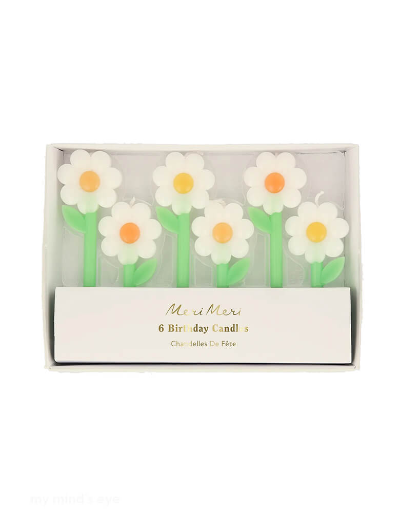 Momo Party's 4.375" Daisy Candles by Meri Meri.  Comes in a set of 6 candles in 2 sizes,  they're perfect for a daisy themed birthday, a garden party or kid's fairy themed party.