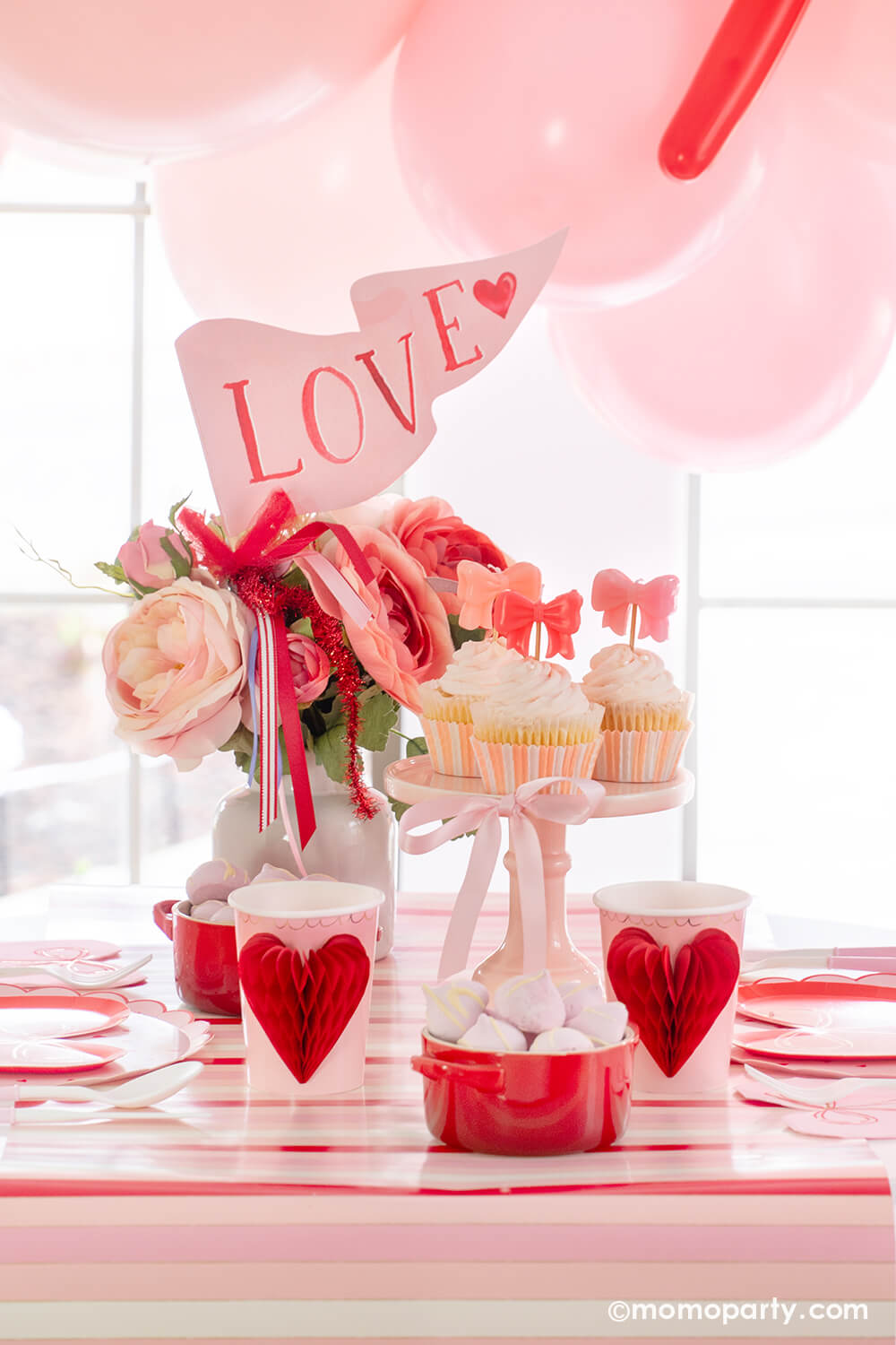 table-decoration-ideas-for-st-valentines-day-valentine-decorations-pink-hearts-chocolate-present-bow-flowers-tablescape  - The Glam Pad