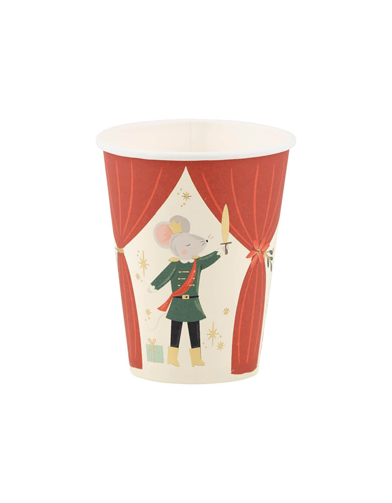 Momo Party's 12oz Nutcracker Paper Cups by My Mind's Eye. This whimsical cup features a nutcracker design and is perfect for any festive occasion. Enjoy your favorite drink in style while adding a touch of whimsy to your festivities. Perfect for a kid's Holiday party!