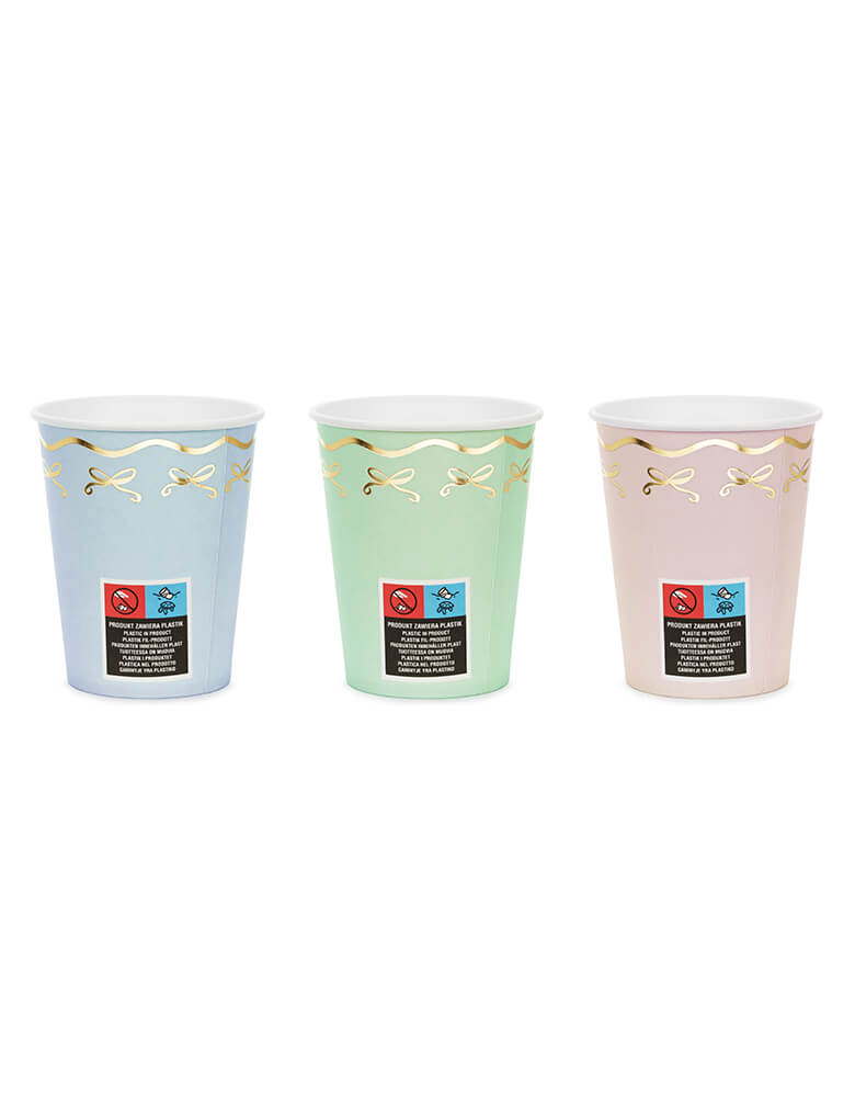 Momo Party 7.4 oz Pastel Coquette Bow Cups by Party Deco. Comes in a pack of 6 party cups in 3 pastel colors, add an elegant touch to your party with these gorgeous pastel coquette bow cups. These charming paper cups feature soft pastel colors and a delicate gold foil coquette bow design. Perfect for any celebration, these cups are sure to impress your guests.