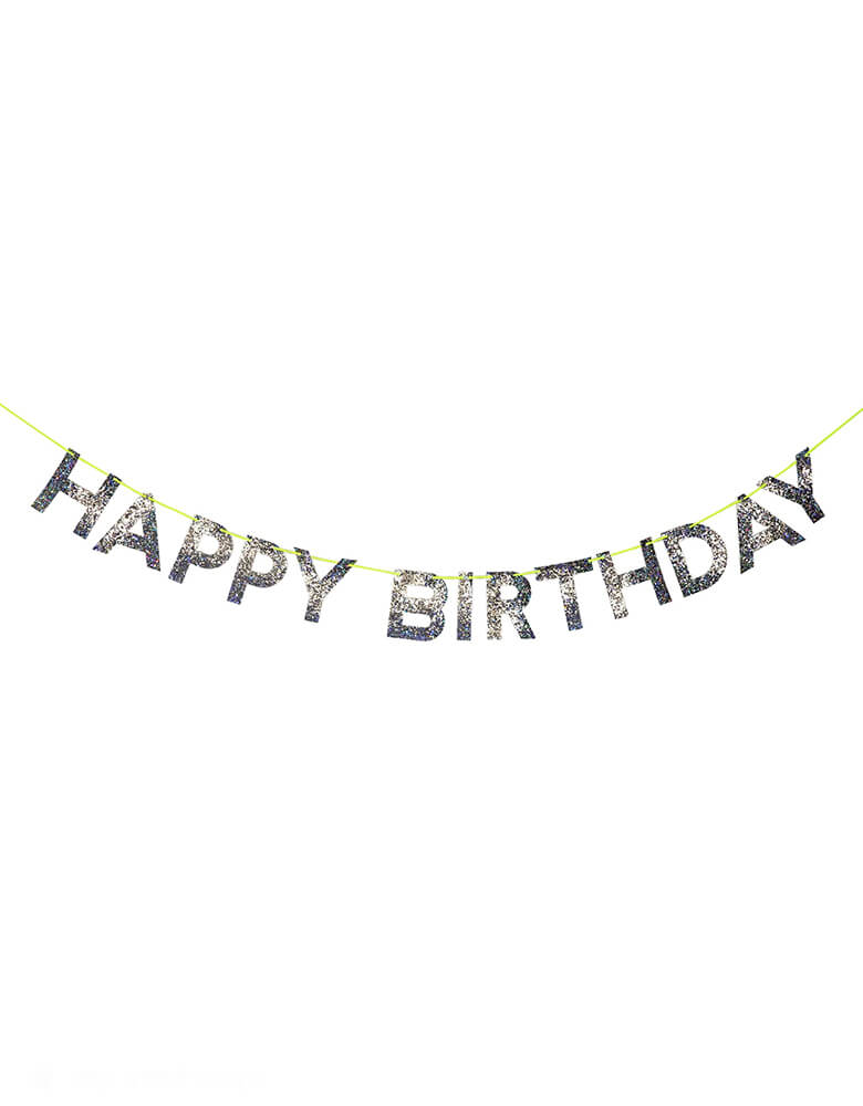 Momo Party's 8ft Silver Happy Birthday Garland by Meri Meri. This spectacular Happy Birthday garland, spelling out a cheery message of good wishes in chunky holographic silver glitter on a neon cord - the perfect way to add a little extra sparkle!