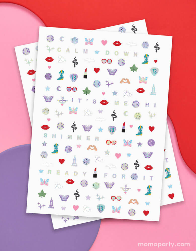 Momo Party's Taylor Swift Era's Nail Stickers by Xo, Fetti. Each pack comes with 544 adhesive nail stickers in the Taylor Swift inspired designs including red lipstick, red lips, butterflies, cowgirl boots, snakes, cassette tapes, guitar picks, heart hand symbols, and heart shaped sunglasses. These nail stickers make perfect party activity for your Swiftie girl's special birthday celebration.