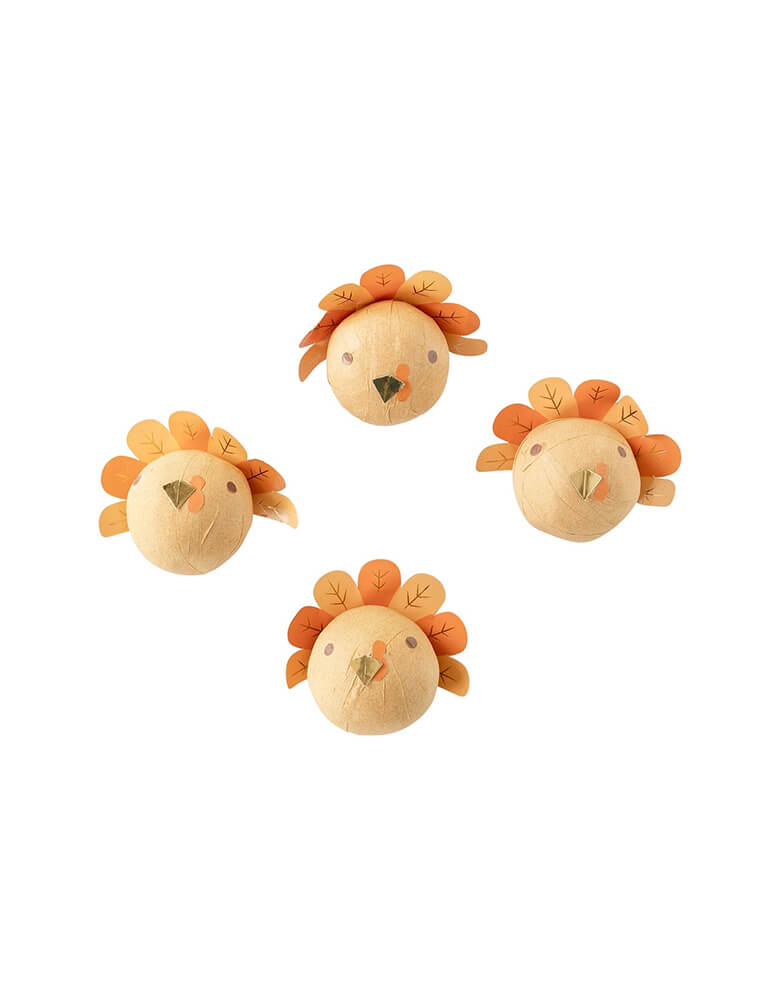 Momo Party's Turkey Surprise Balls by My Mind's Eye. They have small toys cleverly hidden inside, creating a fun game for kids at the harvest table. Don't miss the surprise - add these quirky and playful balls to your Thanksgiving festivities!