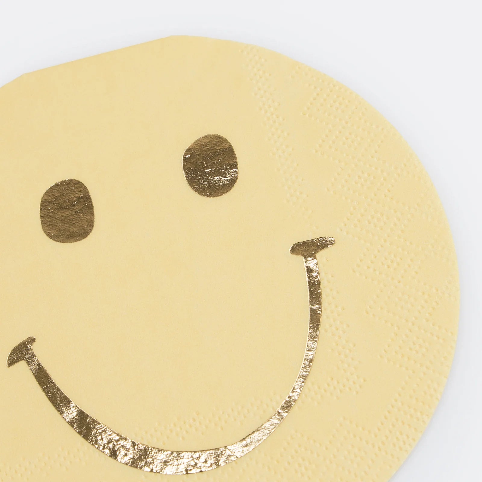 Details of A smiley face with gold details die-cut napkin from Momo Party's Happy Face Icons Diecut Napkins by Meri Meri.  This set of napkins are perfect for any happy celebration. Be it a groovy themed party or a retro nostalgia themed celebration.