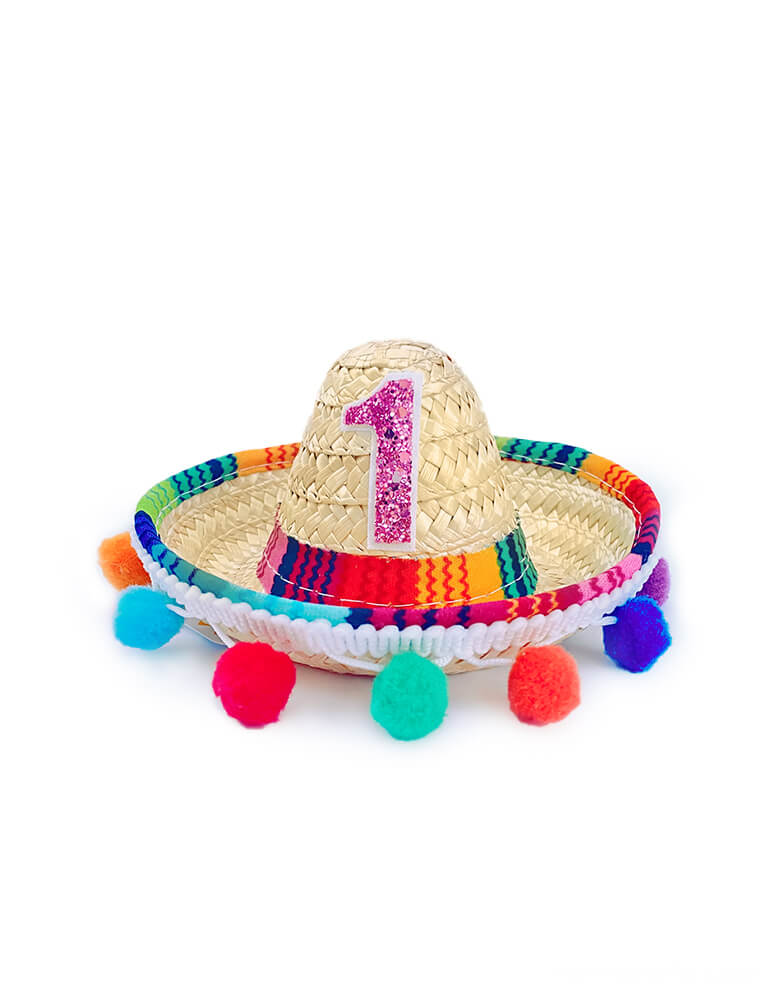 Little Blue Olive - First Fiesta Mini Straw Sombrero with Bright Pom Poms. This hat is attached to a skinny elastic headband for comfort and long wearing. A fun hat for your baby girl's first fiesta birthday party, taco Tuesday party, taco 'bout a party, or Cinco de Mayo celebration!! 